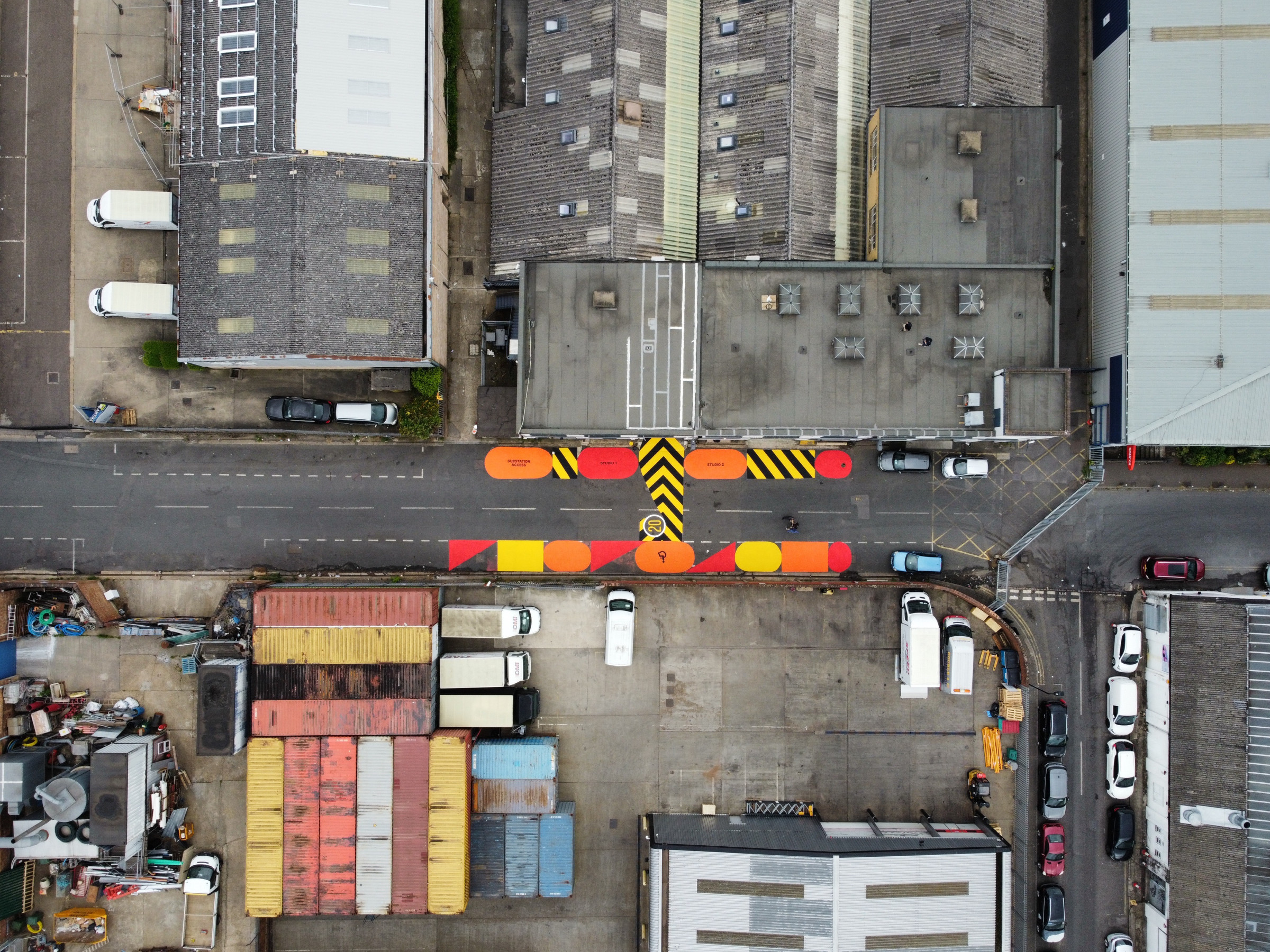 Looking directly down on a number of grey and colourful studios in Park Royal